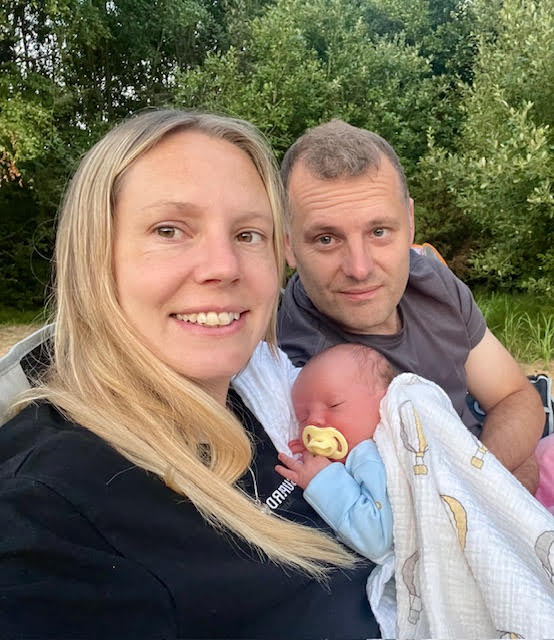 Happy family with newborn